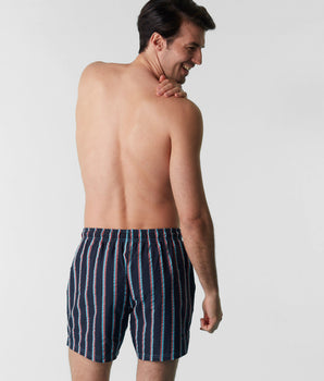 Blue swimming trunks in jacquard fabric with stripes